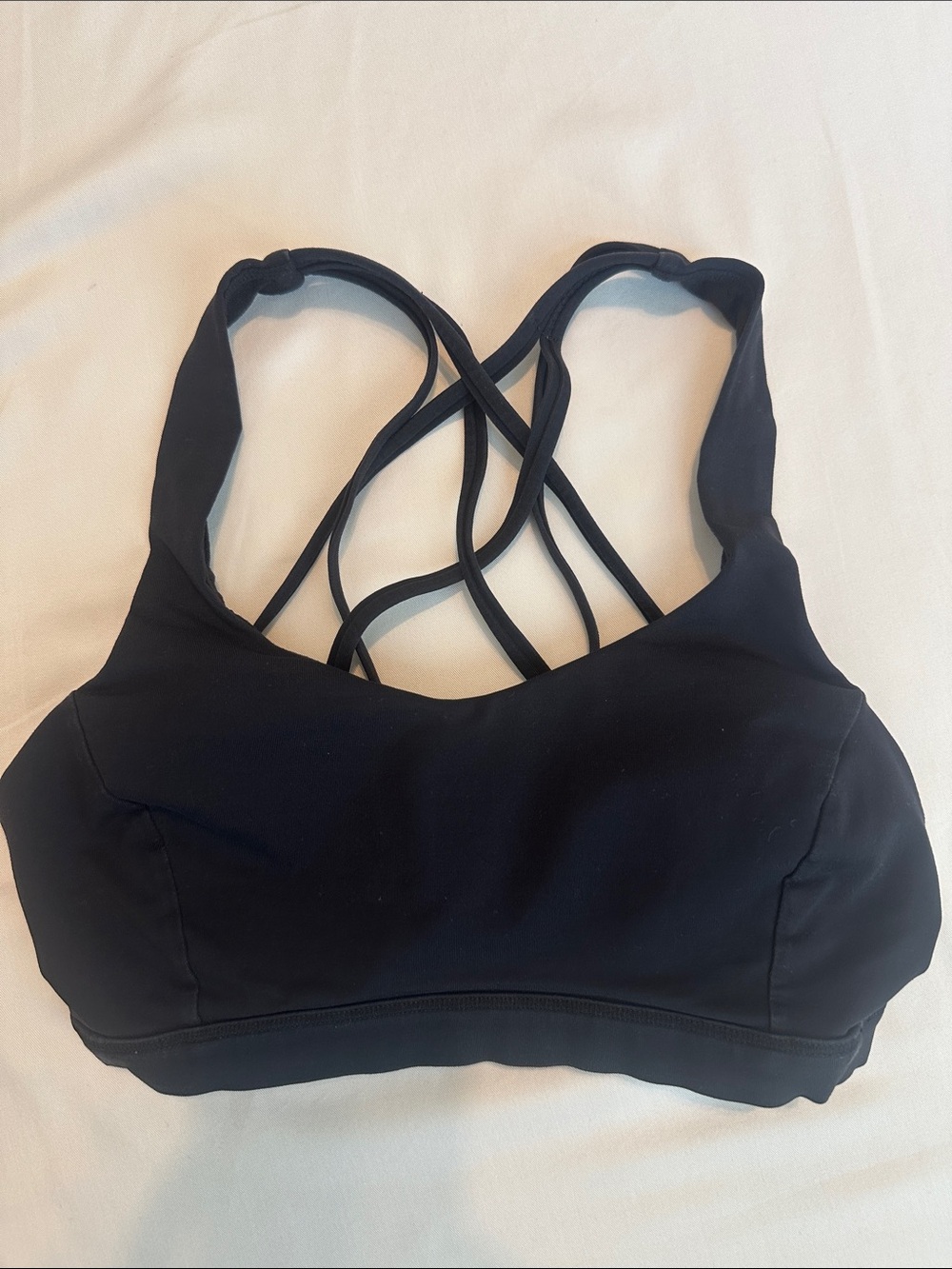 Lululemon Black Strappy Sports Bra - size 6, light support.